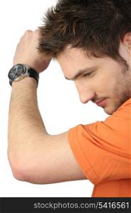 Casual young man wearing wrist watch