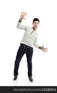 Casual young man with a astonish expression against a white background 