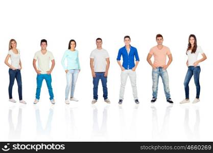 Casual young people with jeans and hands in their pockets isolated on a white background