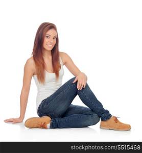 Casual young woman sitting on the floor isolated on a white background
