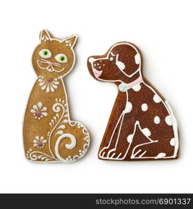 Cat and dog ginger cookies on white background