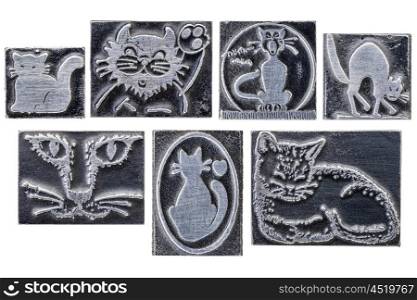 cat dingbats in isolated vintage letterpress metal printing blocks