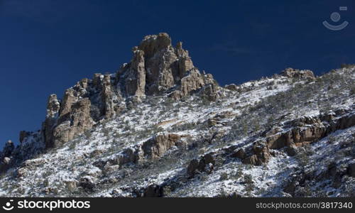 Catalina Mountains slope dusted with snow, viewed from a Mount Lemmon vista, high above the Sonoran desert of Tucson, Arizona, in America&rsquo;s Southwest;