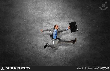 Catch up with time. Concept of time with funny businessman running in a hurry