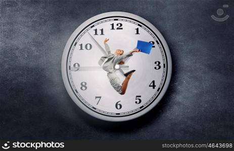 Catch up with time. Concept of time with funny businesswoman running in a hurry