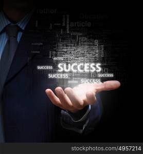 Catch your success. Close up of businessman hand presenting business success concept