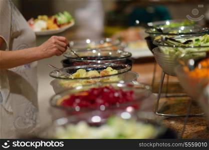 catering buffet food indoor in luxury restaurant with meat colorful fruits and vegetables