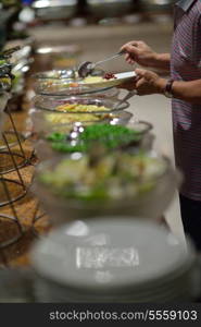 catering buffet food indoor in luxury restaurant with meat colorful fruits and vegetables