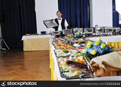 catering buffet food party preparation man