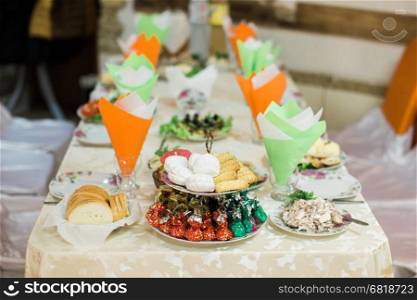 catering table set or served banquet table at restaurant