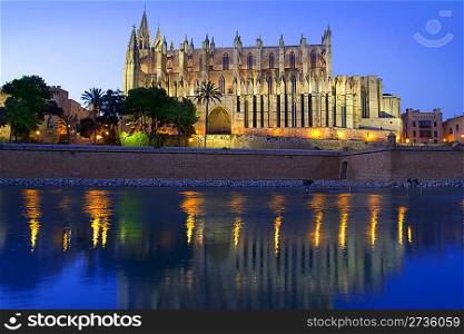Cathedral of la Seu Majorca in Palma de Mallorca reflection over lake at Balearic islands