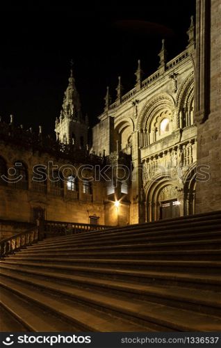 Cathedral of Santiago of Compostela seen from Silversmith Square at night. Romanesque facade