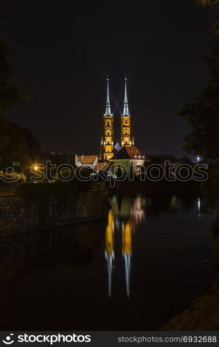 Cathedral of St. John the Baptist in the Tumskoe island in the dark. Wroclaw. Poland