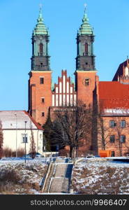 Cathedral of the Blessed Virgin Mary on the island Tumski sunny winter day. Poznan. Poland.. Poznan. Cathedral on Tumskiy Island on a sunny day.