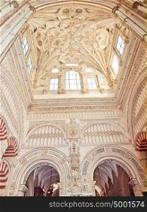 Cathedral placed in the centre of the Mezquita (old mosque) in Cordoba, Spain. UNESCO World Heritage Site. Interior view.