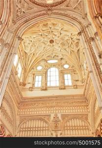 Cathedral placed in the centre of the Mezquita (old mosque) in Cordoba, Spain. UNESCO World Heritage Site. Interior view.