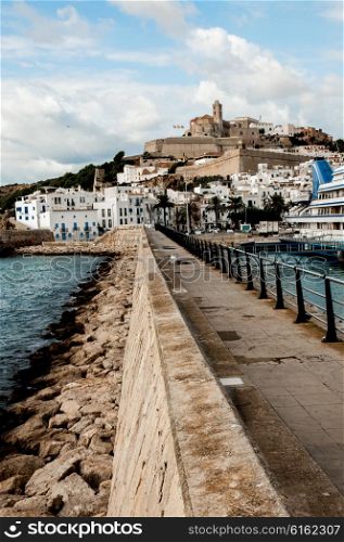 Cathedral Santa Maria as viewed from the pier of the harbour in the old town of Ibiza Island.
