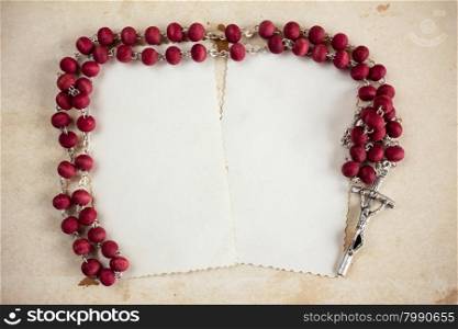 Catholic rosary and two empty cards with copy-space