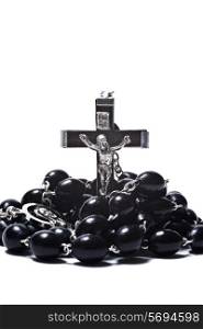 Catholic rosary with crucifix isolated on white background closeup