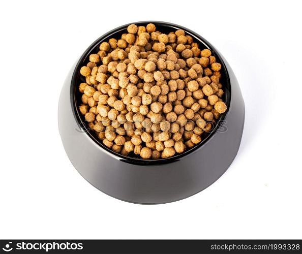 Cats and dogs dry food in a bowl isolated with clipping path