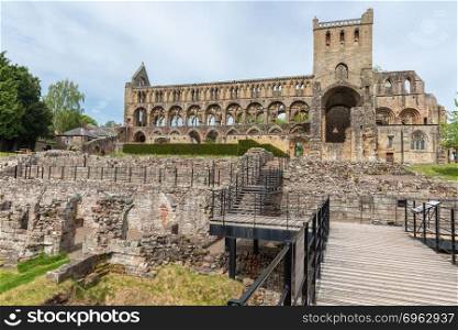 Catwalk to medieval ruins of Jedburgh abbey in Scottish borders.. Catwalk to ruins of Jedburgh abbey in Scottish borders