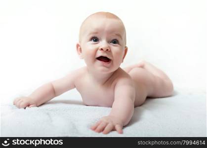 caucasian baby boy with blue eyes on white background