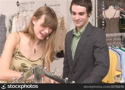 Caucasian Couple Shopping In A Stylish Boutique