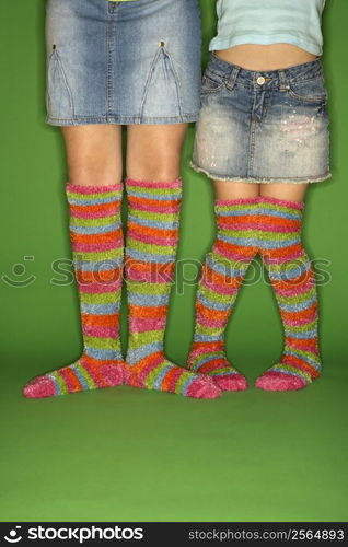 Caucasian female children wearing striped socks.