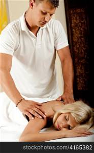Caucasian getting a romantic massage