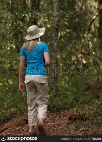 Caucasian girl hiking in Kenya Africa