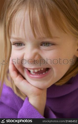 Caucasian Girl Laughing And Showing Her Teeth