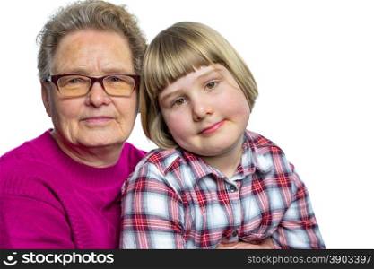 Caucasian grandchild sitting on lap of grandmother isolated on white background