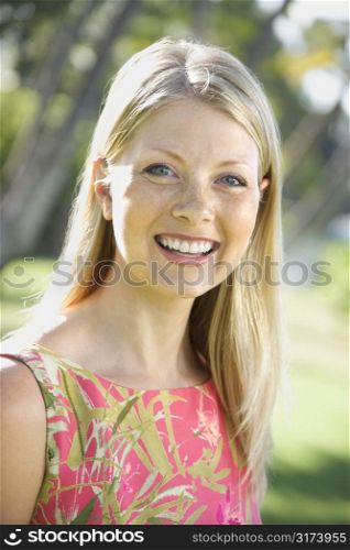 Caucasian mid adult woman smiling at viewer.