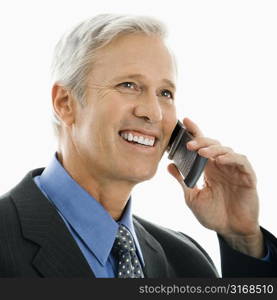 Caucasian middle aged man smiling and talking on cell phone.