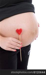 caucasian pregnant woman with heart on the belly isolated on white background