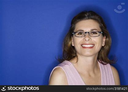 Caucasian prime adult female wearing eyeglasses smiling.