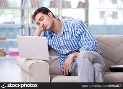 Caucasian student with laptop preparing for university exams. Caucasian student with laptop preparing for university exams