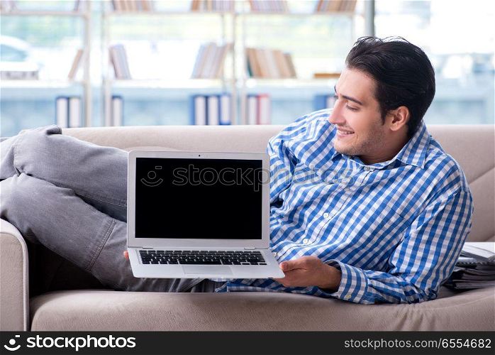 Caucasian student with laptop preparing for university exams. Caucasian student with laptop preparing for university exams