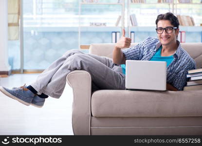 Caucasian student with laptop preparing for university exams. Caucasian student with laptop preparing for university exams