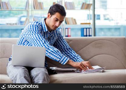 Caucasian student with laptop preparing for university exams. Caucasian student with laptop preparing for university exams