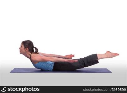 Caucasian Woman Posing On A Blue Yoga Mat