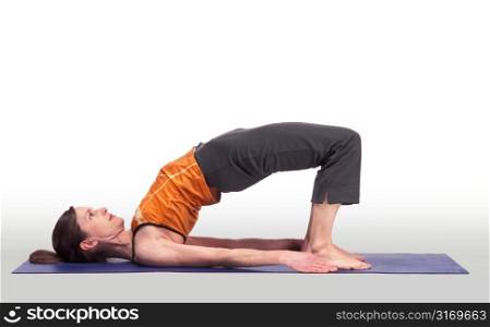 Caucasian Woman Posing On A Blue Yoga Mat