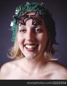 Caucasian Woman Wearing Star Sunglasses And A Goofy Hat And Smiling