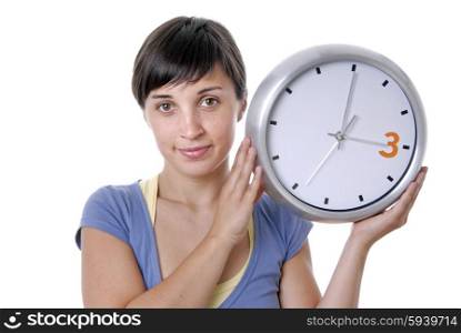 Caucasian young woman holding a big clock