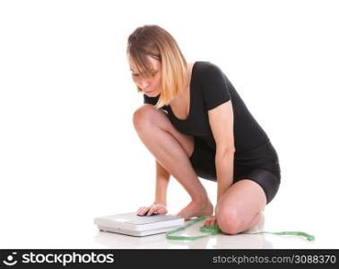 Caucasian young woman weight scale isolated over white background