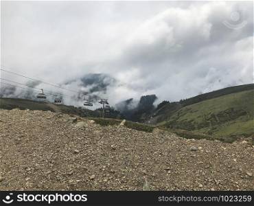 Caucasus mountains wrappednin clouds. Roza Khutor, Russia