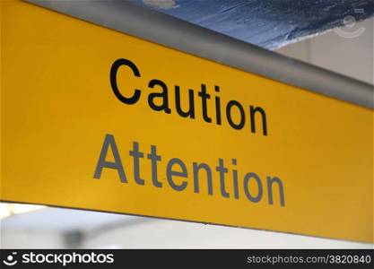 Caution sign at airport