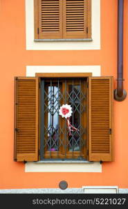 cavaria varese italy abstract window wood venetian blind in the concrete orange