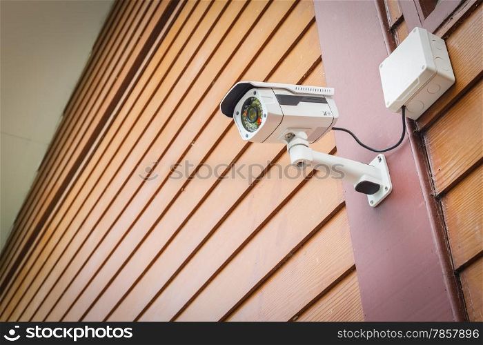 cctv camera security on wall background for safety concept