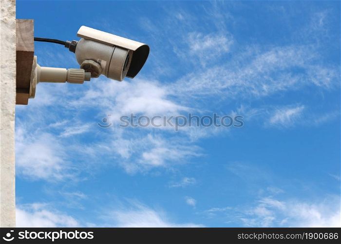 CCTV camera system on blue sky background with copy space.